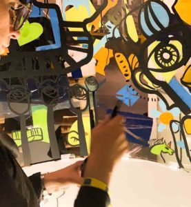 aNa street Graffiti Artiste lors d'une animation Fresque Participative en anniversaire d'entreprise à Lyon