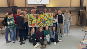 Le groupe des participants et participantes à l'Animation intégration originale fresque du climat à Rouen de décembre 2023.