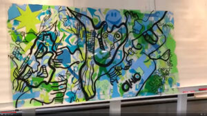 La magnifique Fresque éco-responsable My Art Box co créée en team building Grenoble par une équipe de 15 personnes en réunion dans un hôtel