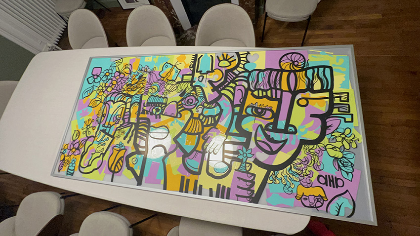 1 fresque Live en team building pour avocats à 50 à Paris 4 Le tableau encadré réalisé en team-building pour avocats à Paris est prêt à être révélé