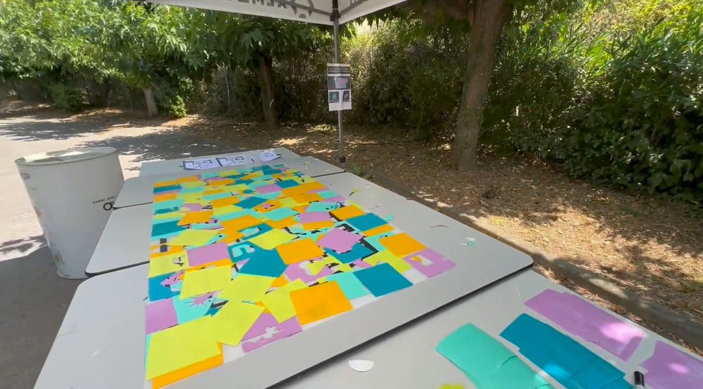 La fresque du team building œuvre collective éco-responsable à Montpellier une fois terminée au verso avant la surprise de la révélation