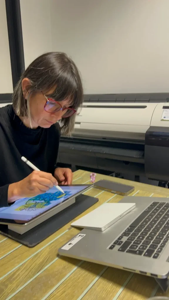 aNa artiste en création digitale sur tablette graphique