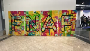 Installation d’une œuvre collaborative en plexiglas sur 4 panneaux grand format, exposée en entreprise, créée par 200 à 400 participants.