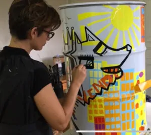 Street Art en Entreprise par ana artiste sur barils de 200 litres