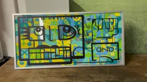 La création collective en inauguration à Chartres encadrée sur place dans son cadre aluminium sur mesure