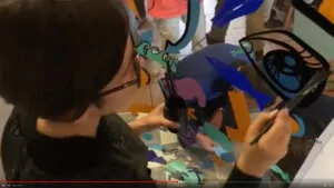 Une Fresque originale art en entreprise en cours de création par aNa artiste à Albi avec des ingénieurs