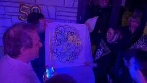 Le cadeau anniversaire artistique digital imprimé et offert à pour les 50 ans d'un homme à Paris