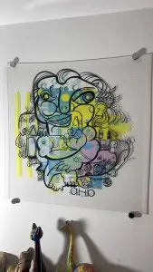 Le cadeau anniversaire artistique digital 50 ans imaginé par aNa artiste exposé au mur