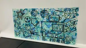 La fresque intégration éco-responsable réalisée à Poitiers avec des formateurs en intégration est composée de 2 formats 1000x1000mm pour être exposée dans un angle