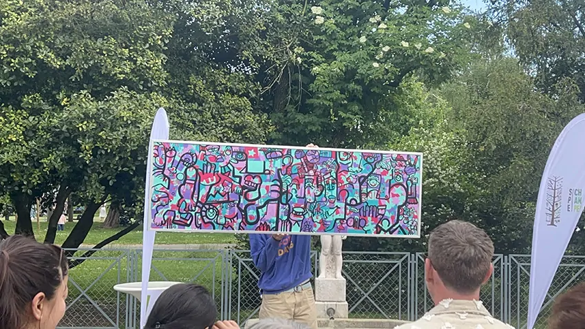 La révélation surprise du tableau en plexi encadré à la fin du team building secteur de la petite enfance à Genève animé par Christophe Chazot